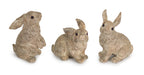A set of 3 handcrafted rabbit figurines made of stone powder and resin. Perfect for collectors and animal lovers.