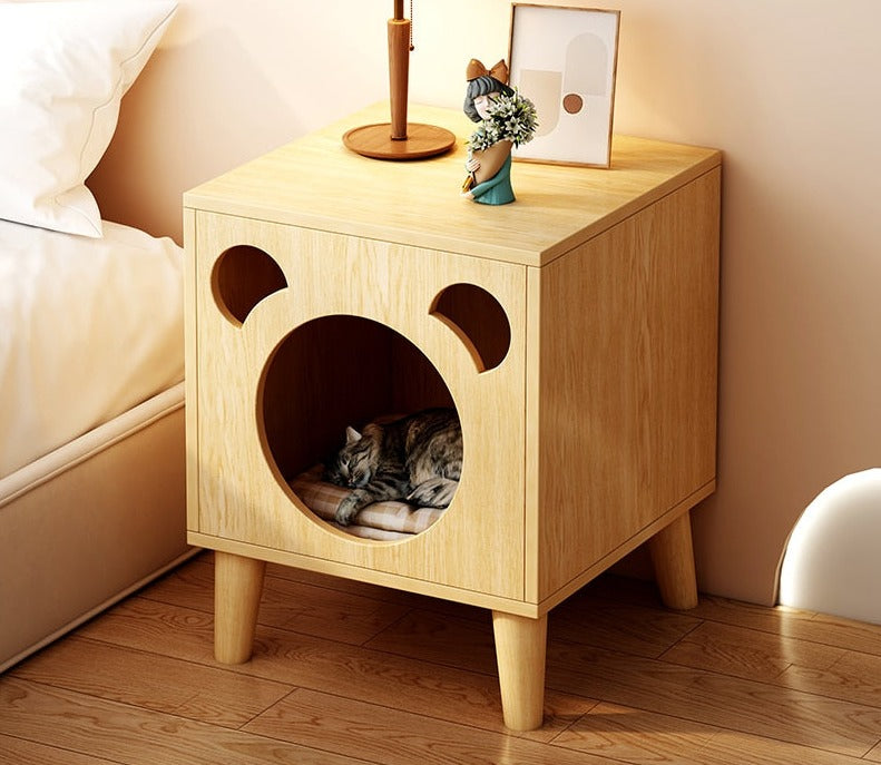 Stay organized and stylish with this cute nightstand that doubles as a comfortable cat house.