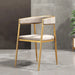 gold velvet chair from Hygge Cave adds a touch of glamour to a living room