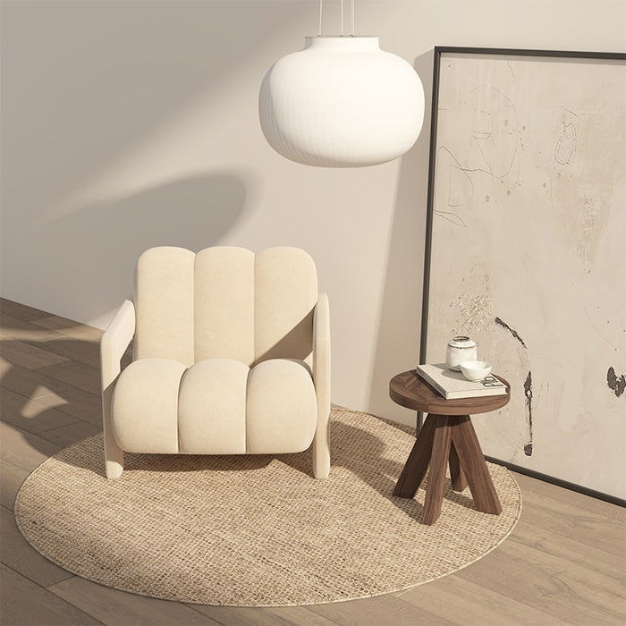 Create a cozy and inviting atmosphere in your living space with this beautiful Nordic Lounge Designer Chair in a neutral beige color.