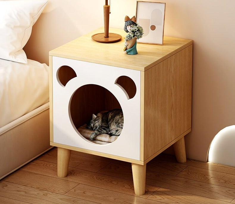 Make your cat feel right at home with this stylish and functional cat house nightstand.