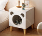 Provide your furry friend with a cozy place to sleep and keep your bedroom organized with this cute cat house nightstand.