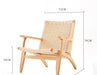 Dimensions of a rattan modern lounge chair in a natural wood finish
