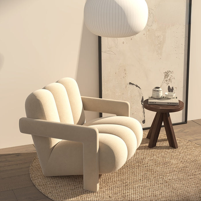 Add a touch of sophistication to your living space with this stunning Nordic Lounge Designer Chair that comes with a matching footstool.