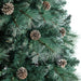 arealistic tree accented with faux pinecones - hygge cave